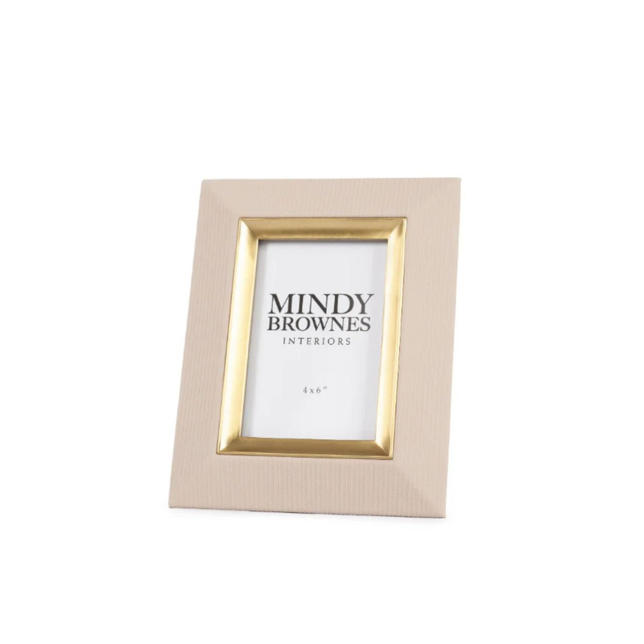 The Sutera Picture Frame in Cream presents a luxurious touch to your cherished memories. Its elegant design with gold detail elevates the beauty of your favourite 4 x 6 photo. Crafted with top-quality materials, it adds a touch of sophistication to any space. Display your special moments with style.