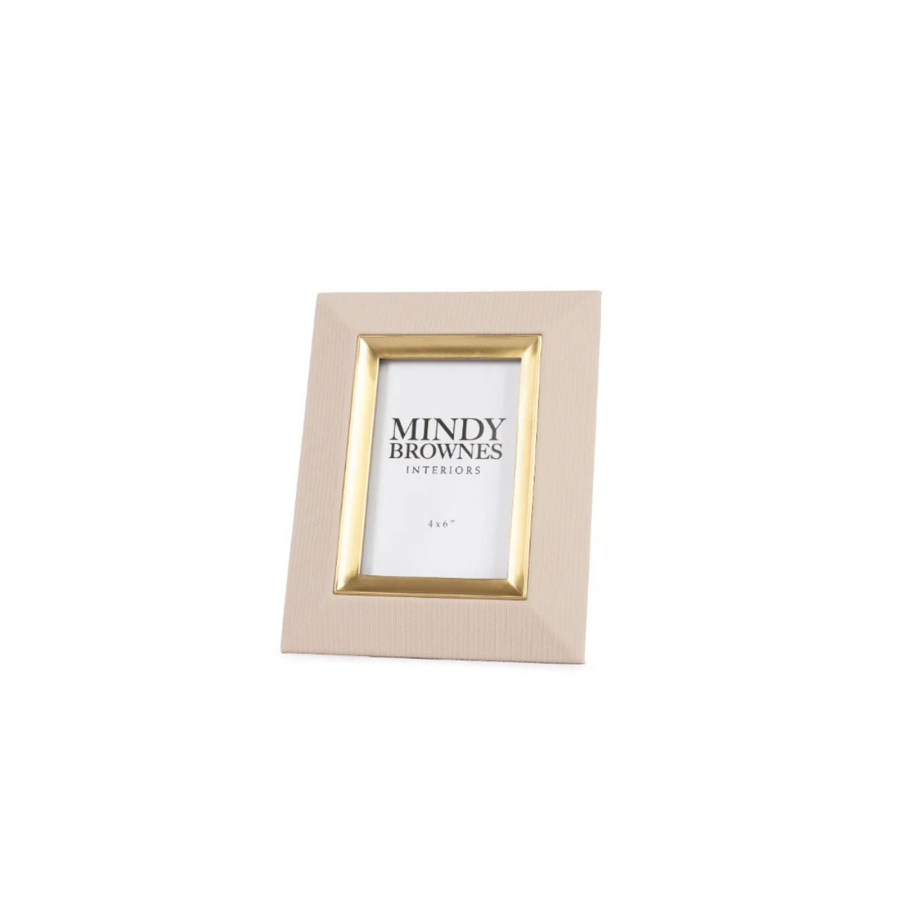 The Sutera Picture Frame in Cream presents a luxurious touch to your cherished memories. Its elegant design with gold detail elevates the beauty of your favourite 4 x 6 photo. Crafted with top-quality materials, it adds a touch of sophistication to any space. Display your special moments with style.