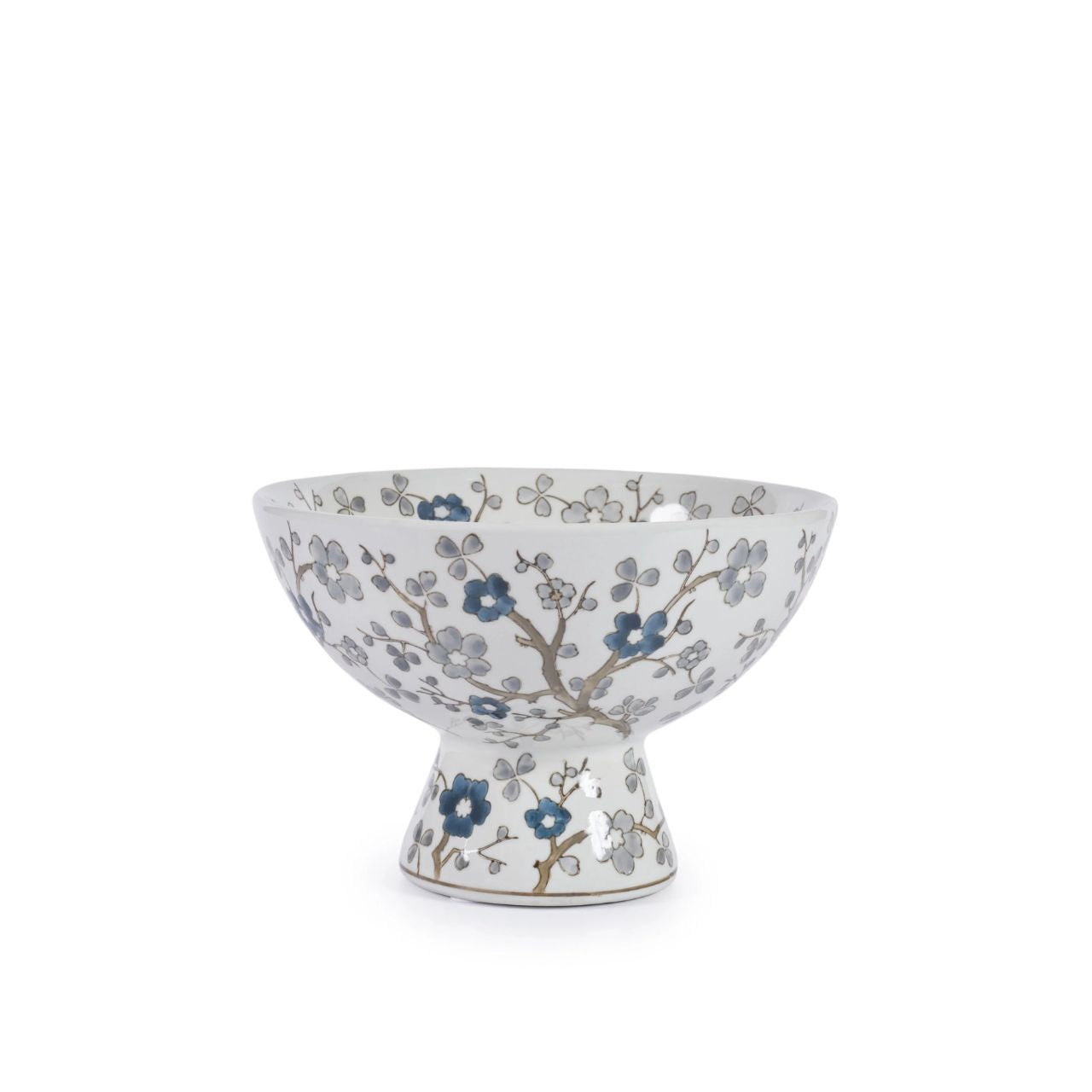 Enhance your décor with the Tiya Bowl. Its elegant floral design, featuring beautiful blue flowers, adds a touch of sophistication to any table setting or shelf.