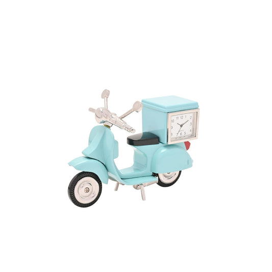 Step back in time with the Miniature Clock - Blue Scooter. This charming, mint-coloured vintage-style scooter, complete with a small analog clock mounted on the front, offers a touch of nostalgia and a splash of colour to any setting.