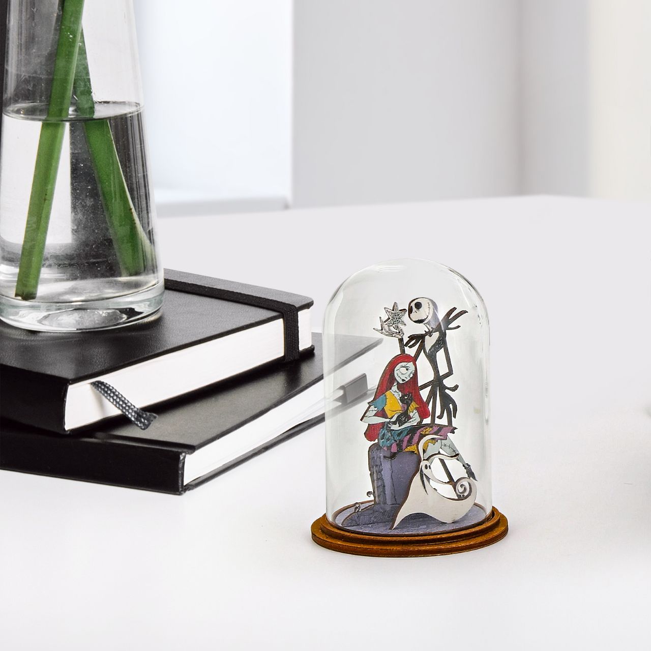 Will Sally the ragdoll's love change Jack Skellington's mind about taking over Christmas? This is a sweet pair with Zero make the perfect gift for any Halloween Town fan. This classic Nightmare Before Christmas decorative Kloche will make a stunning display in any home.