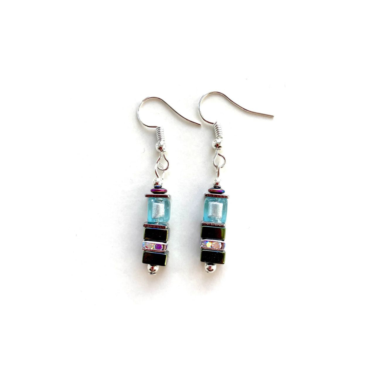 These earrings comes with silver-lined Murano-style glass cubes in aqua, complemented by Hematite gemstone squares in sea green with the added sparkle of silver Rhinestone spacer beads.
