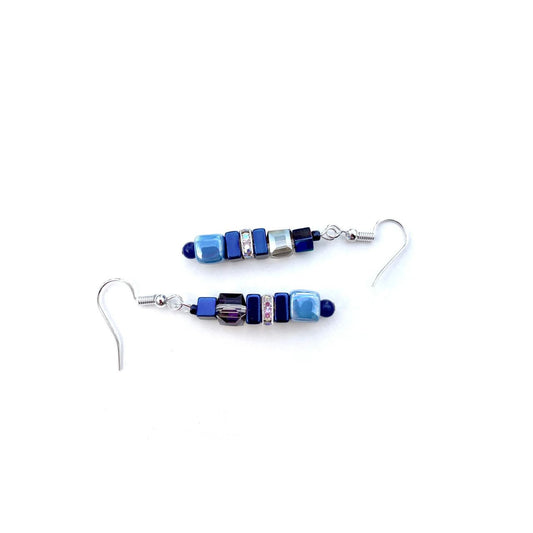 These earrings combine cubes of blue handmade Ceramic cubes in shades of blue with blue Hematite gemstone squares and cubes, blue faceted Crystal cubes and sparkling rhinestones.
