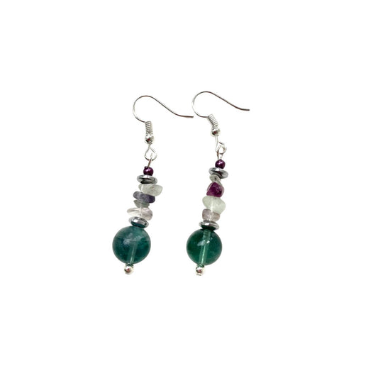 Fluorite is a fascinating translucent gemstone that ranges in colour from green to purple and all shades in between. These earrings are composed of round Fluorite gemstones beads and chips complimented by silverplated Hematite gemstone rondelles.