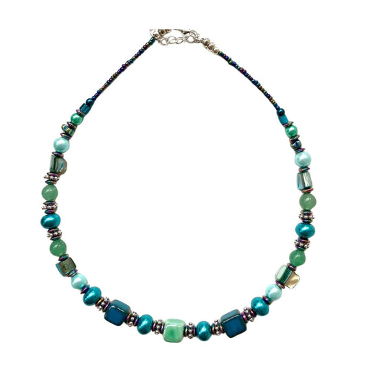 Necklace with blue/green Ceramic cubes, Amazonite and Hematite gemstones and blue/green natural shell beads. Length: approximately 16 inches (40cms) with a 2 inch (5 cm) extension chain.