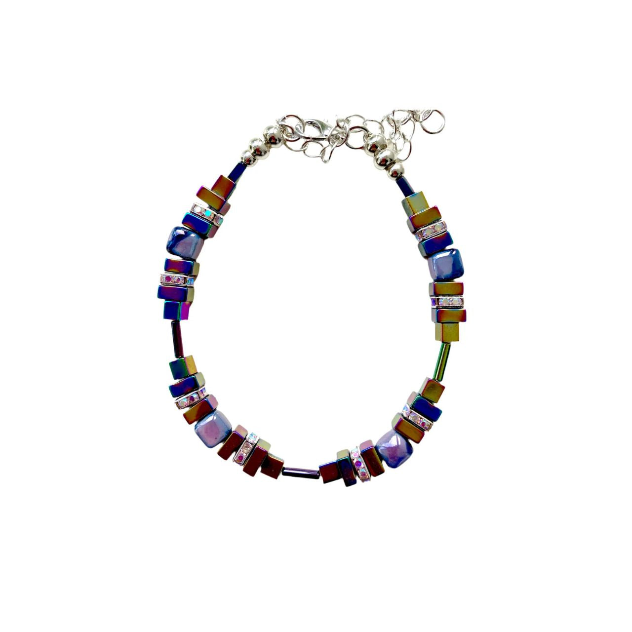 Lilac and white handmade Ceramic Cubes are combined with rainbow hued Hematite gemstone squares and sparkling silver-plated Rhinestone spacers.