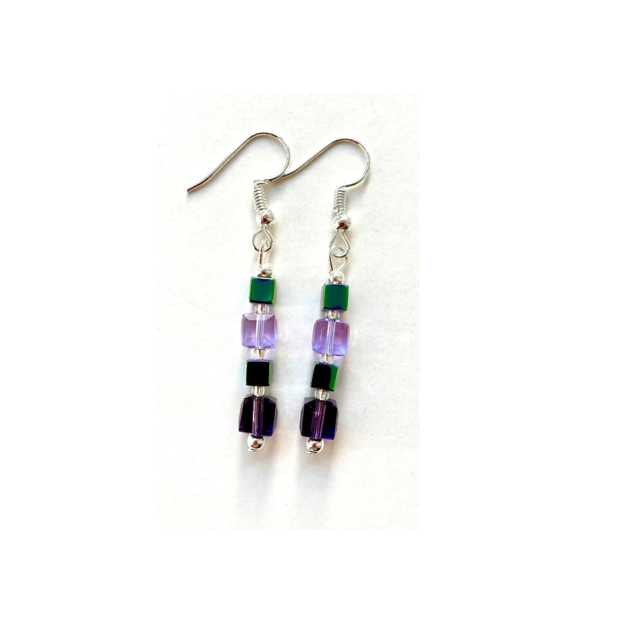 A harmonious combination of purple and lilac Crystal cubes coupled with purple/green plated Hematite gemstone cubes.
