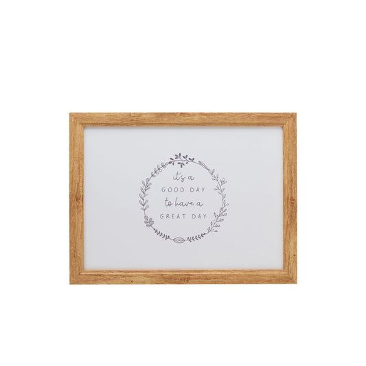 The cushioned fabric surrounding the tray is adorned with grey recurring floral images, providing both comfort and visual interest.