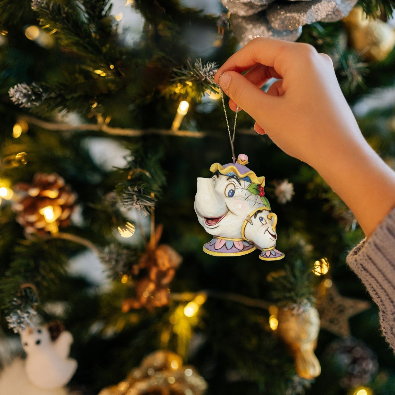 This spectacular piece features a pair of popular characters - Mrs Potts &amp; Chip - from the classic animated film, Beauty and the Beast. Designed by award winning artist and sculptor, Jim Shore for the Disney Traditions brand.