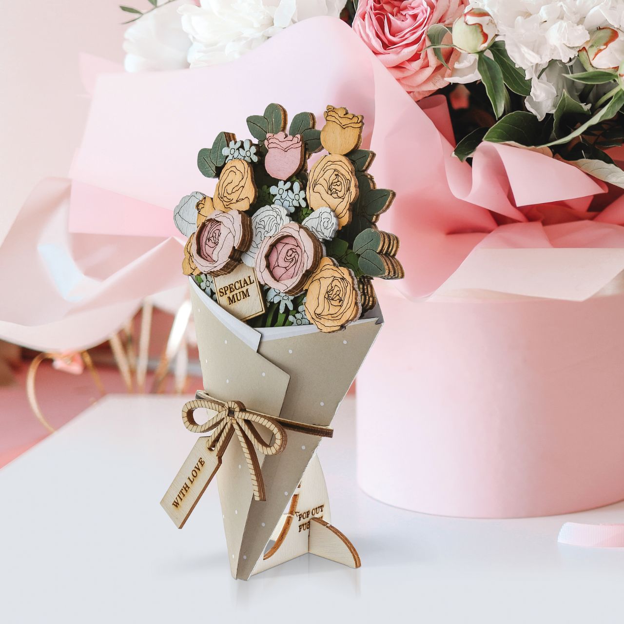 Surprise and delight someone with a beautiful bouquet figural card - Send them loads of love through the post with our letterbox inspired 3D figurine card.