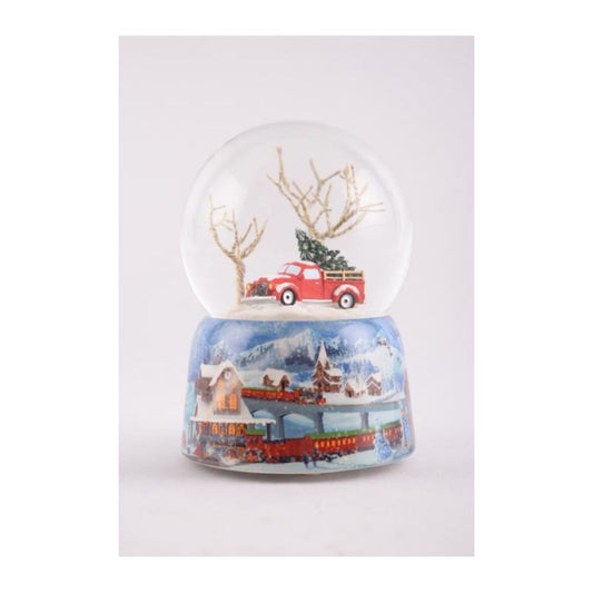Glitter globe 120 mm. The train turn around the globe and Santa fly above the houses while the melody “Jingle Bells” plays.