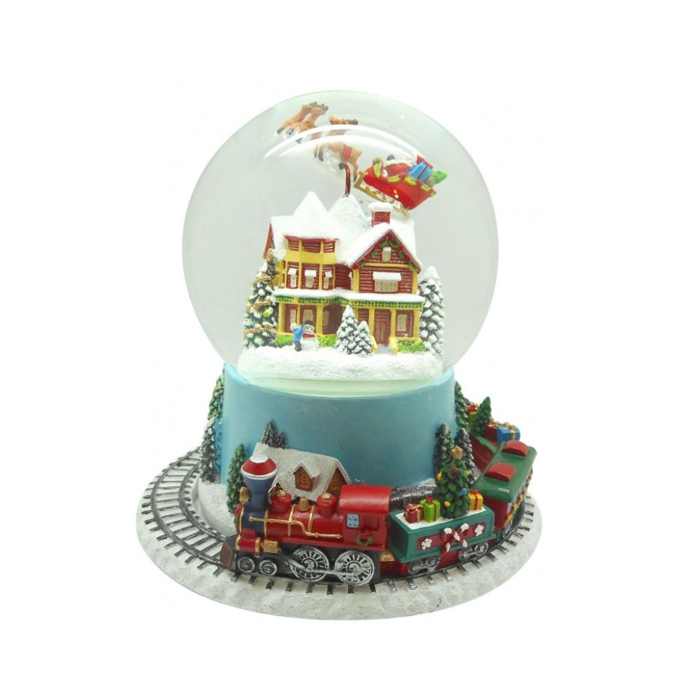 Glitter globe 120 mm. The train turn around the globe and Santa fly above the houses while the melody “Jingle Bells” plays.