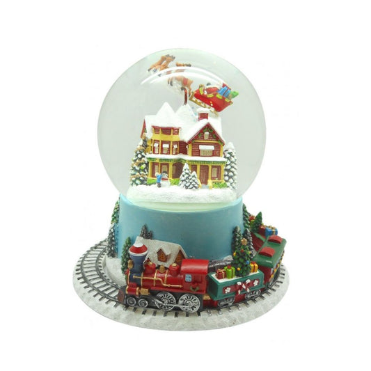 Glitter globe 120 mm. The train turn around the globe and Santa fly above the houses while the melody “Jingle Bells” plays.