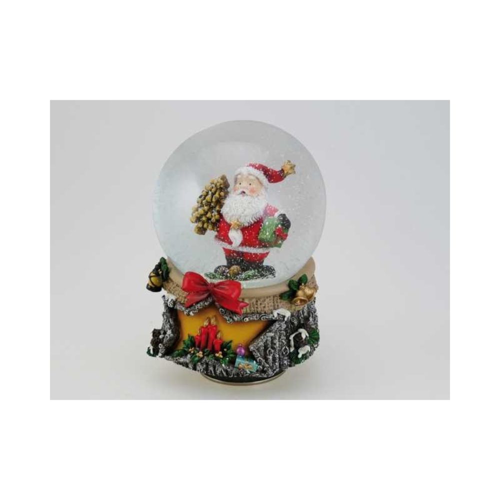 Snow Globe 100 mm. Santa with a tree and a present. Turns to the melody We wish you a merry Christmas.