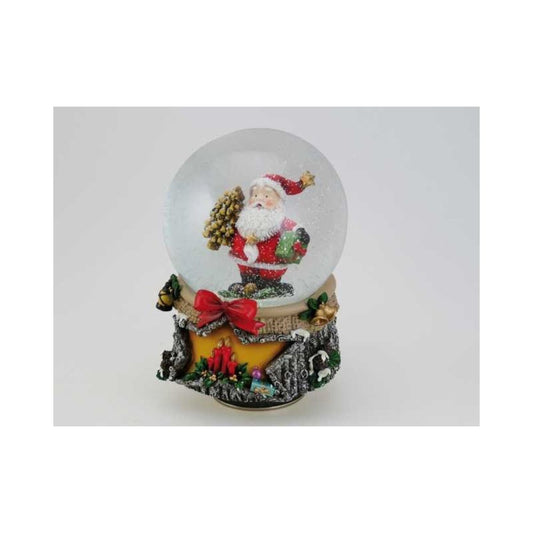 Snow Globe 100 mm. Santa with a tree and a present. Turns to the melody We wish you a merry Christmas.