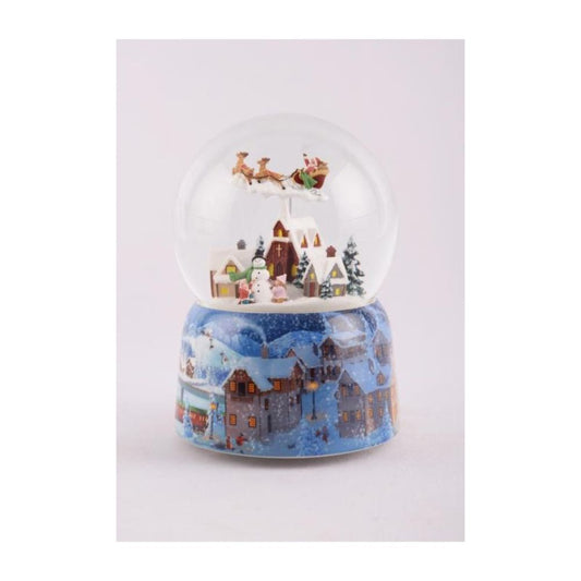 Snow globe flying Santa 150 mm. The wind-up music plays a popular Christmas melody while Santa and his sleigh “fly” above the village.