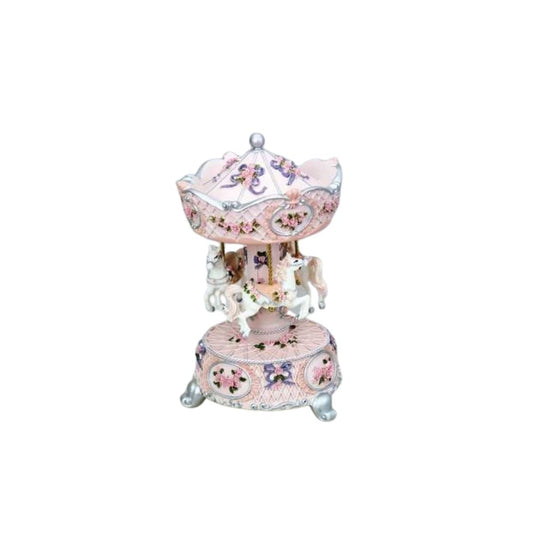 Rose carousel decorated with rose roses and pink ribbon turns to the melody Bolero.