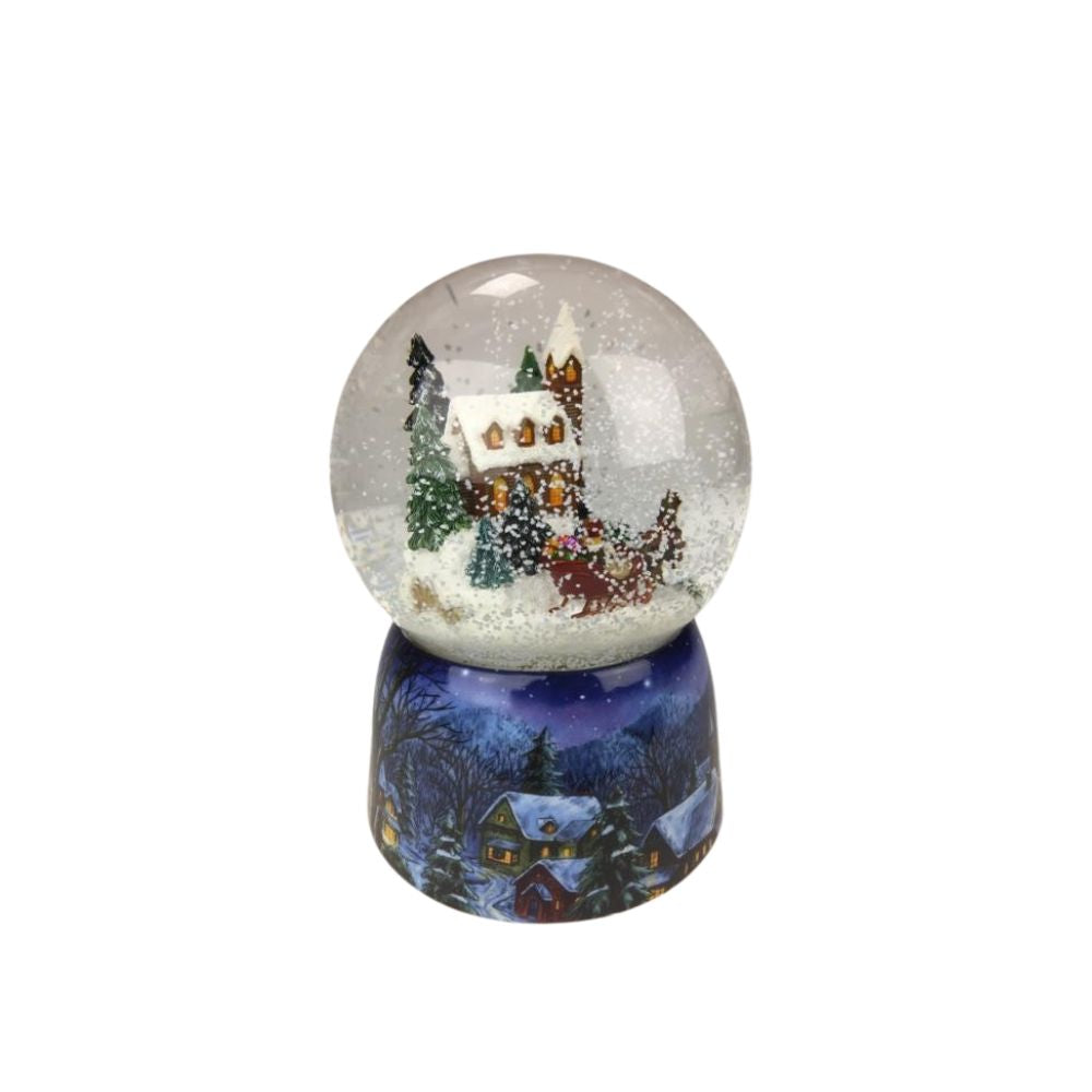 Snow globe sleigh ride. In the globe filled with snow, a couple takes a nostalgic sleigh ride past a snow-covered church surrounded by fir-trees. The base is painted with snowy village scenes. By winding the musical mechanism up, the scene starts to rotate inside the globe to the melody “Jingle Bells”.