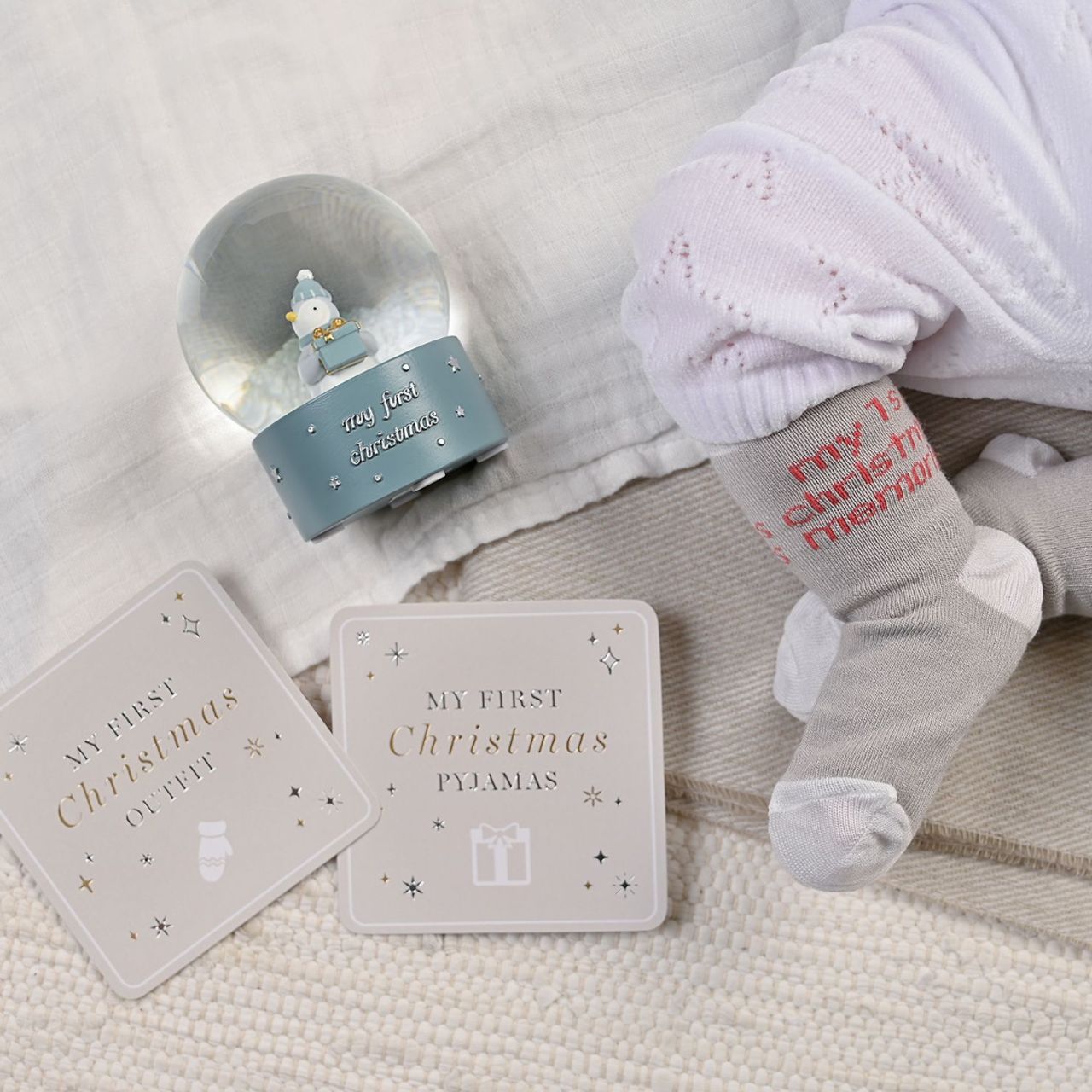 A Bambino BY JULIANA 'My First Christmas' Penguin Water Globe. Brimming with whimsical charm, this item is an enchanting addition to any nursery or Christmas display.