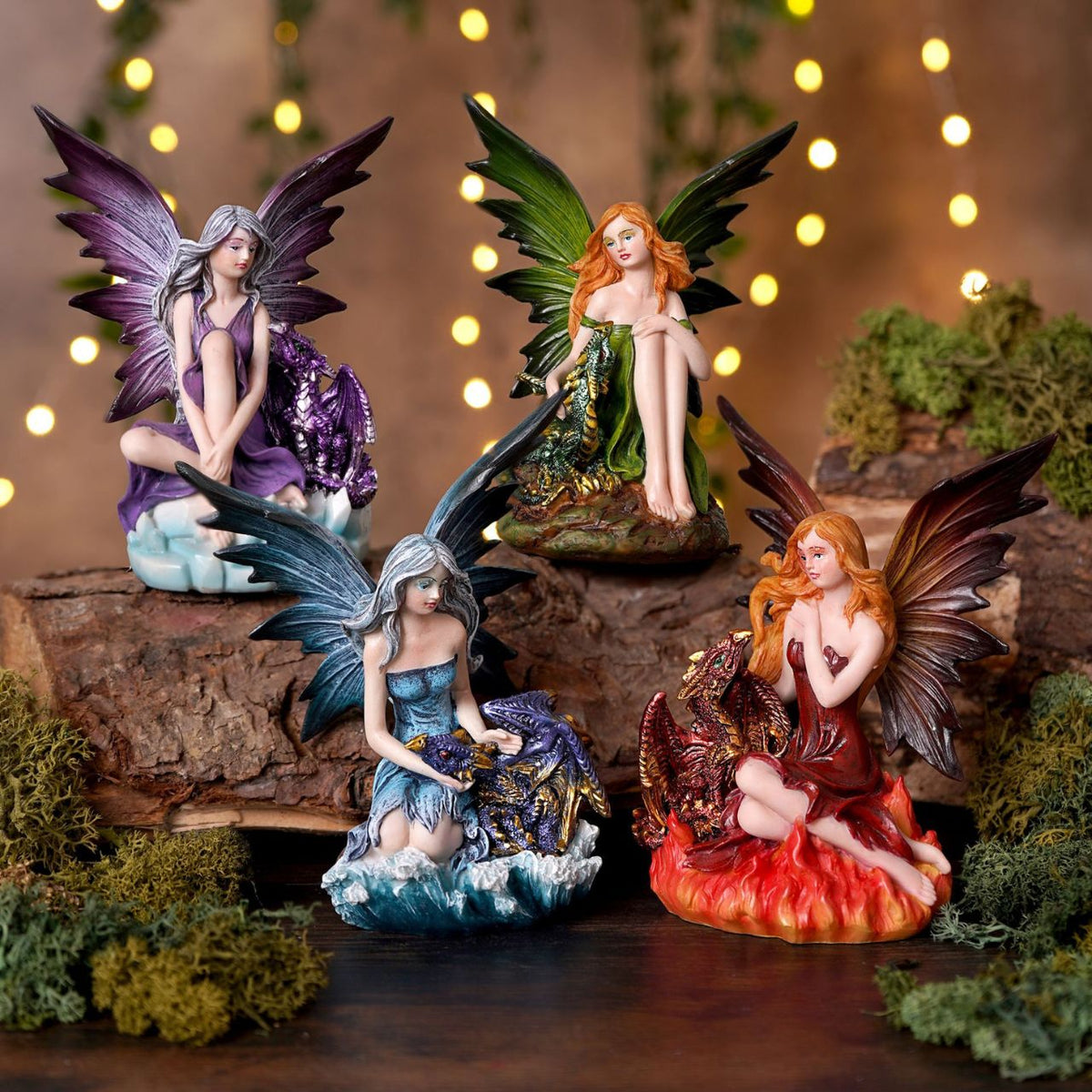 Mystic Legends Colourful Fairies set is a beautifully detailed collection of fantasy ornaments, designed to bring vibrant colour and enchanting character to any display. Each figurine features a delicately sculpted fairy seated in a unique pose, accompanied by intricately detailed dragons or elemental-inspired bases, creating a strong sense of storytelling and individuality.