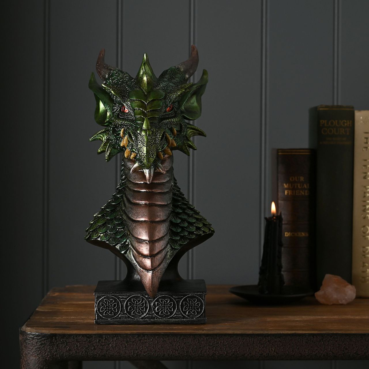 This majestic green and bronze coloured piece with a metallic effect finish, is made from high-quality resin allowing for intricate detailing. A brand for customers and avid collectors who are drawn to the mystical and gothic aesthetic.