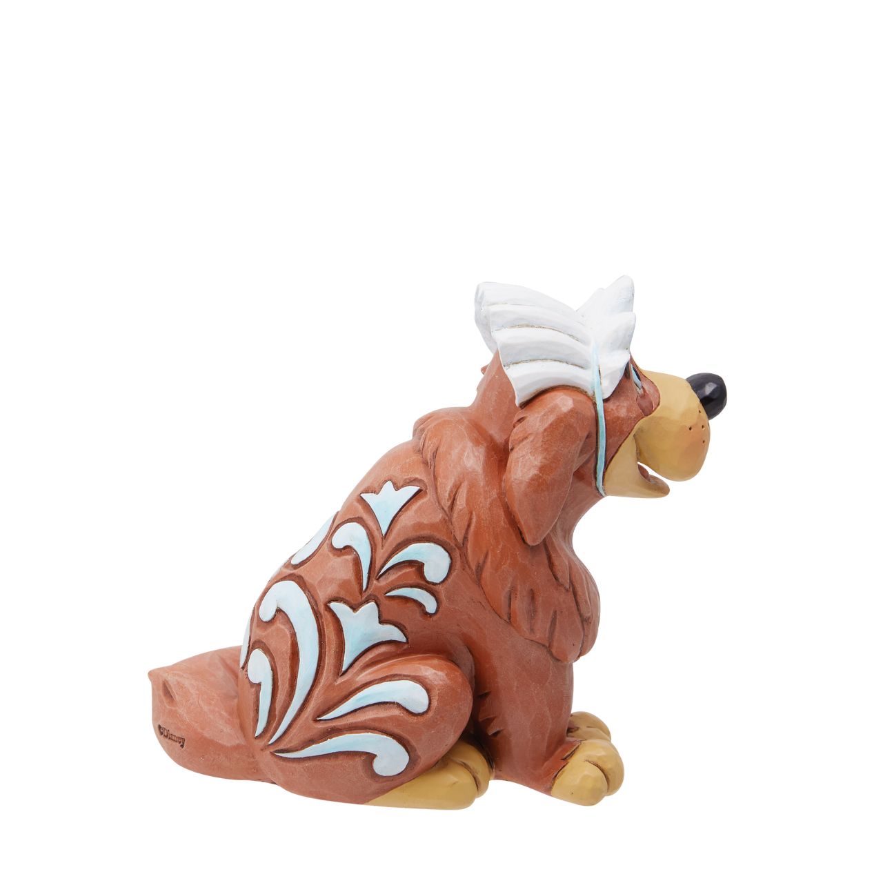 Bring a touch of Disney magic into your home with the whimsical and enchanting Nana Mini Figurine from Disney Traditions by Jim Shore. This beautiful piece captures the essence of one of the most beloved characters from Peter Pan, bringing her charm, beauty and elegance to your Disney collection.