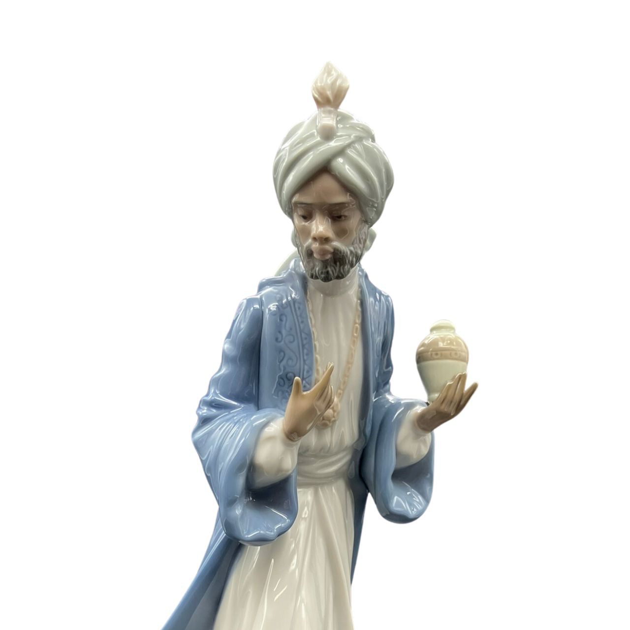 Nao by Lladro King Balthasar with Jug Wisemen  Nao porcelain figurine “King Balthasar with Jug” from the Christmas Collection.  Sculpted by Regino Torrijos, this figurine is part of the nativity set.