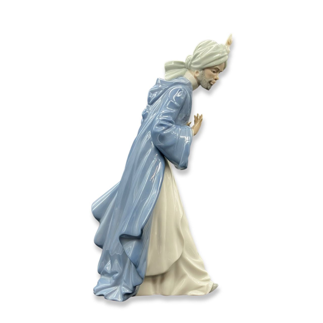 Nao by Lladro King Balthasar with Jug Wisemen  Nao porcelain figurine “King Balthasar with Jug” from the Christmas Collection.  Sculpted by Regino Torrijos, this figurine is part of the nativity set.