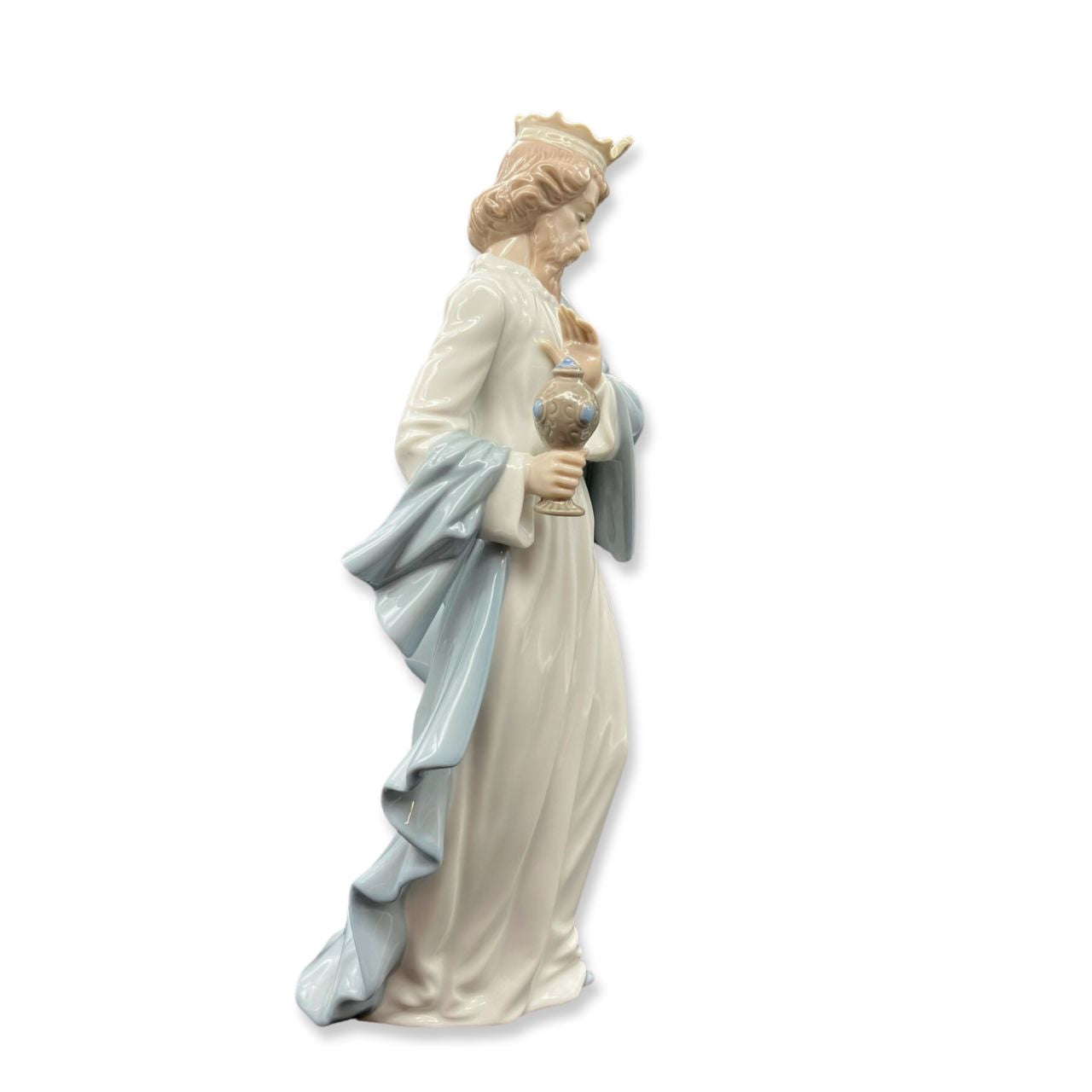 Nao by Lladro King Gaspar with Cup Wisemen  Nao porcelain figurine “King Gaspar with Cup” from the Christmas Collection.  Sculpted by Regino Torrijos, this figurine is part of the nativity set.