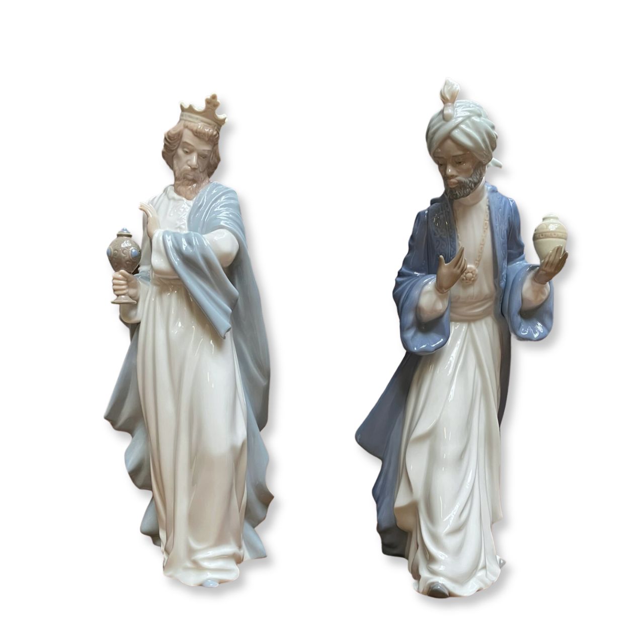 Nao by Lladro King Gaspar with Cup Wisemen  Nao porcelain figurine “King Gaspar with Cup” from the Christmas Collection.  Sculpted by Regino Torrijos, this figurine is part of the nativity set.