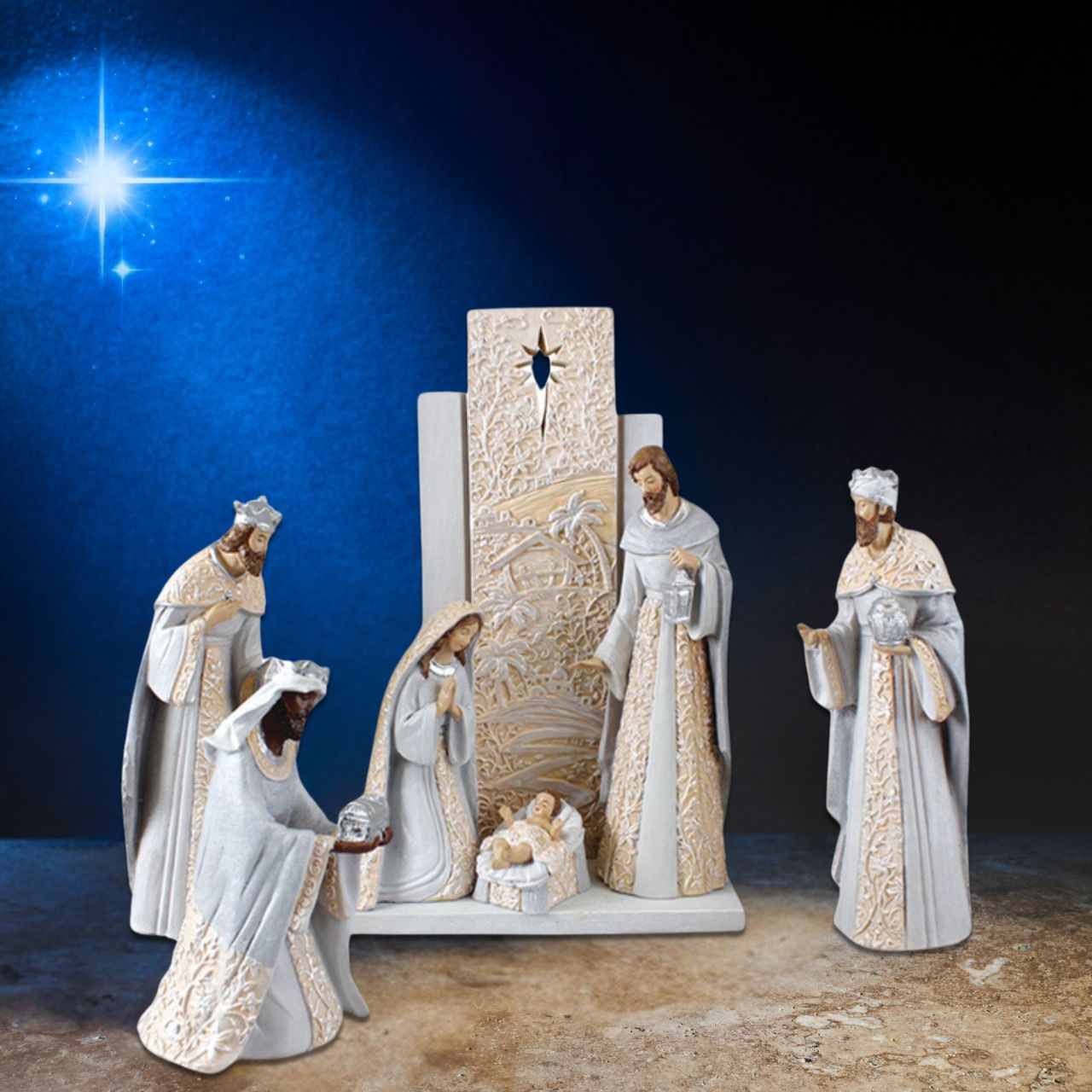 This Grey &amp; Gold Nativity Set includes 6 pieces measuring 9 1/2 inches each, complete with a stunning back drop. Crafted with intricate detail, this set will add a touch of elegance to your holiday décor. Bring the story of the Nativity to life and create a meaningful centrepiece for your home.