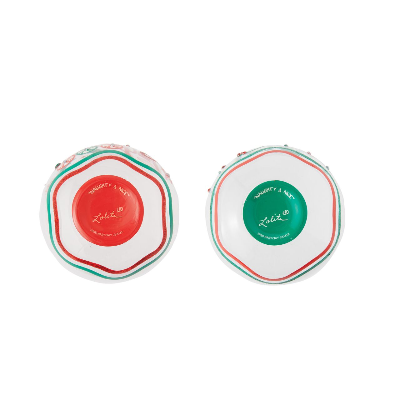 This festive stemless wine glass let's you choose your Christmas attitude. With hand-painted peppermint candies, ornaments, snowflakes, and holly, this two-sided glass places you on both of Santa's lists.