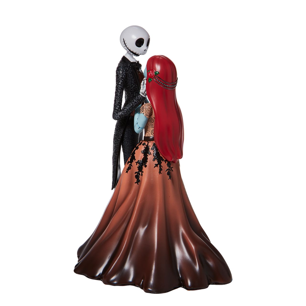 Disney Showcase Jack and Sally Couture de Force Figurine  Jack and Sally are an unlikely coupling of precious proportions. The Skellington king and ragdoll lock eyes in a romantic embrace in this show stopping Couture de Force Disney showcase piece. Wearing elegant robes, the pair prepare to dance the night away.