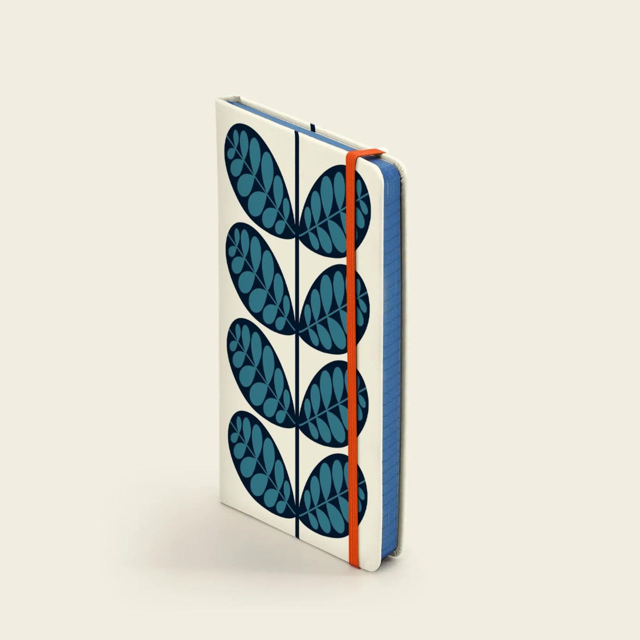 Orla Kiely Botanical Small Notebook  Write down your goals, plans and your weekly shopping list in style with our Botanica notebook. This notebook has a hardcover with rounded corners, an elastic closure and matching ribbon bookmark. Comes with a lined paper layout and expandable inner back pocket.