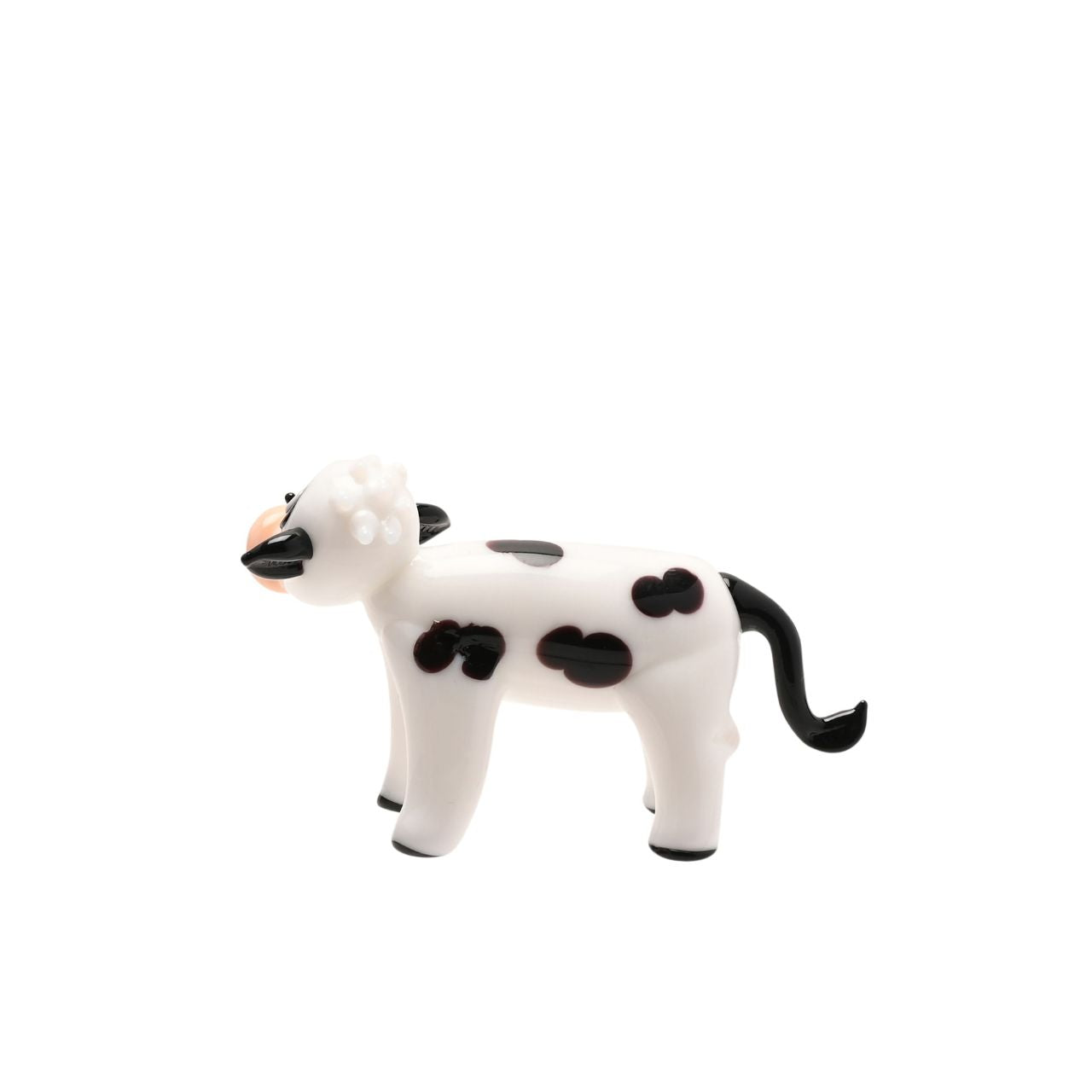 This black and white spotted cow is full of character, crafted from hand-blown glass. A charming little piece to display on its own or as part of a growing collection.