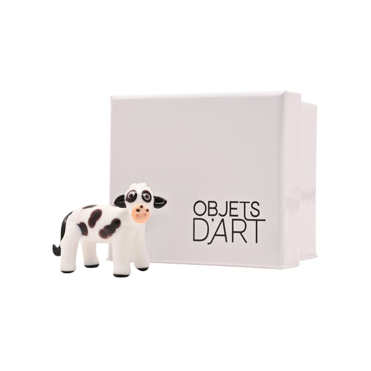 This black and white spotted cow is full of character, crafted from hand-blown glass. A charming little piece to display on its own or as part of a growing collection.