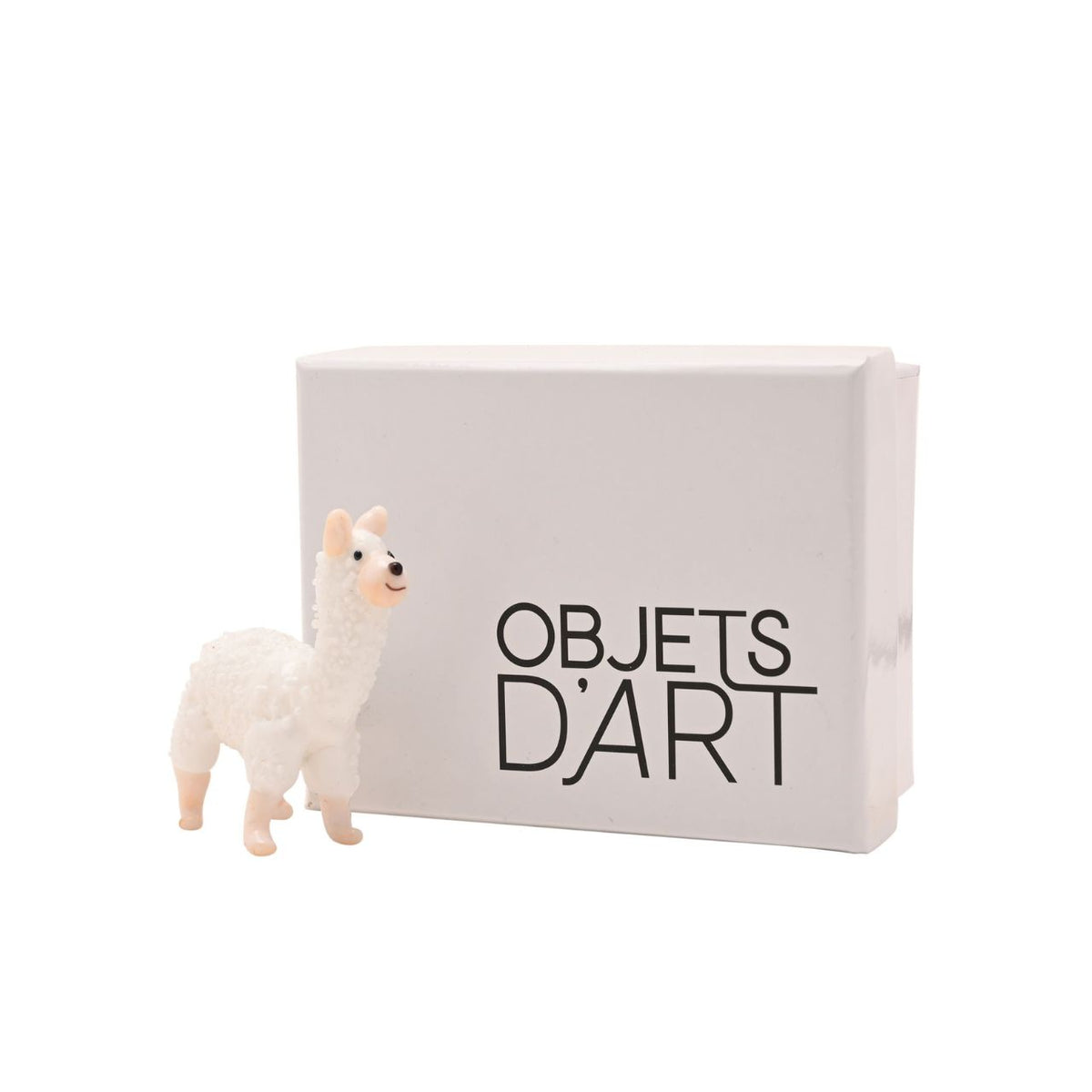 A beautifully elegant handmade glass ornament. From Objets d'Art by SOPHIA - hand blown