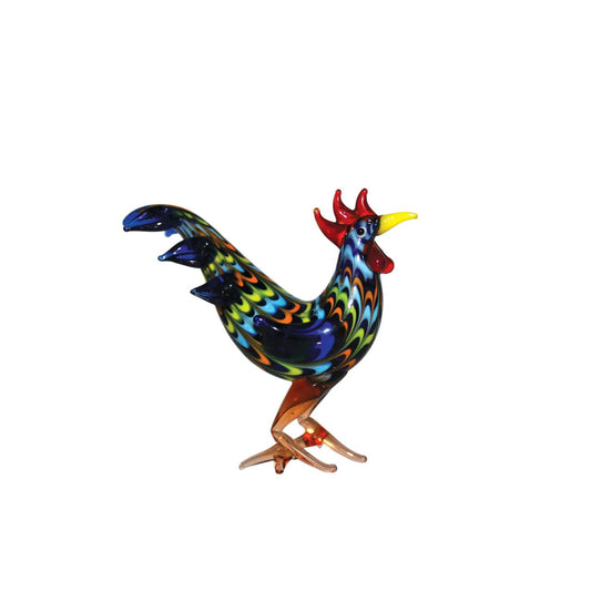 A beautiful stylised handmade coloured glass Cockerel ornament. From Objets d'Art by SOPHIA - hand blown and one hundred percent unique.