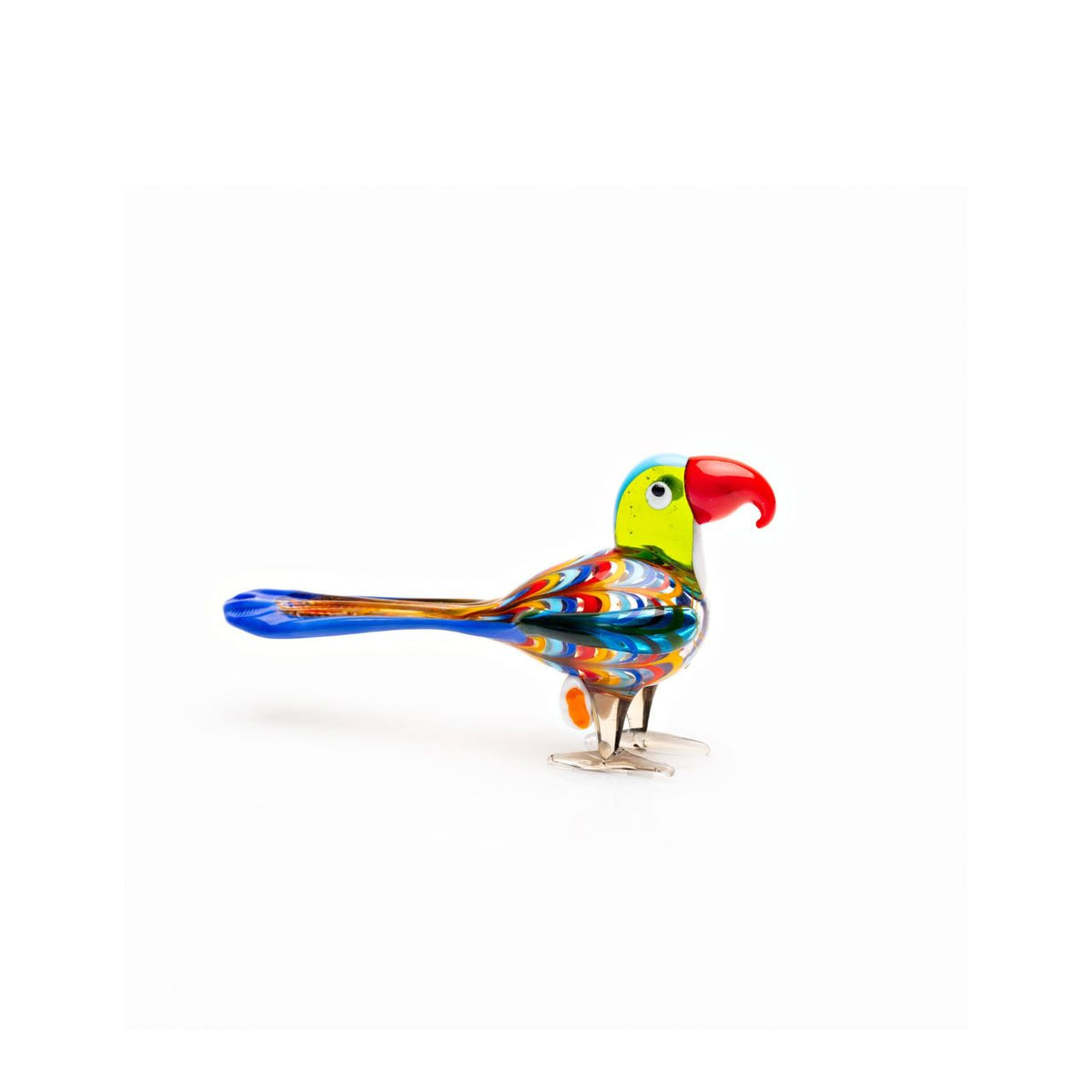 A beautiful stylised handmade coloured glass Parrot ornament. From Objets d'Art by SOPHIA - hand blown and one hundred percent unique.