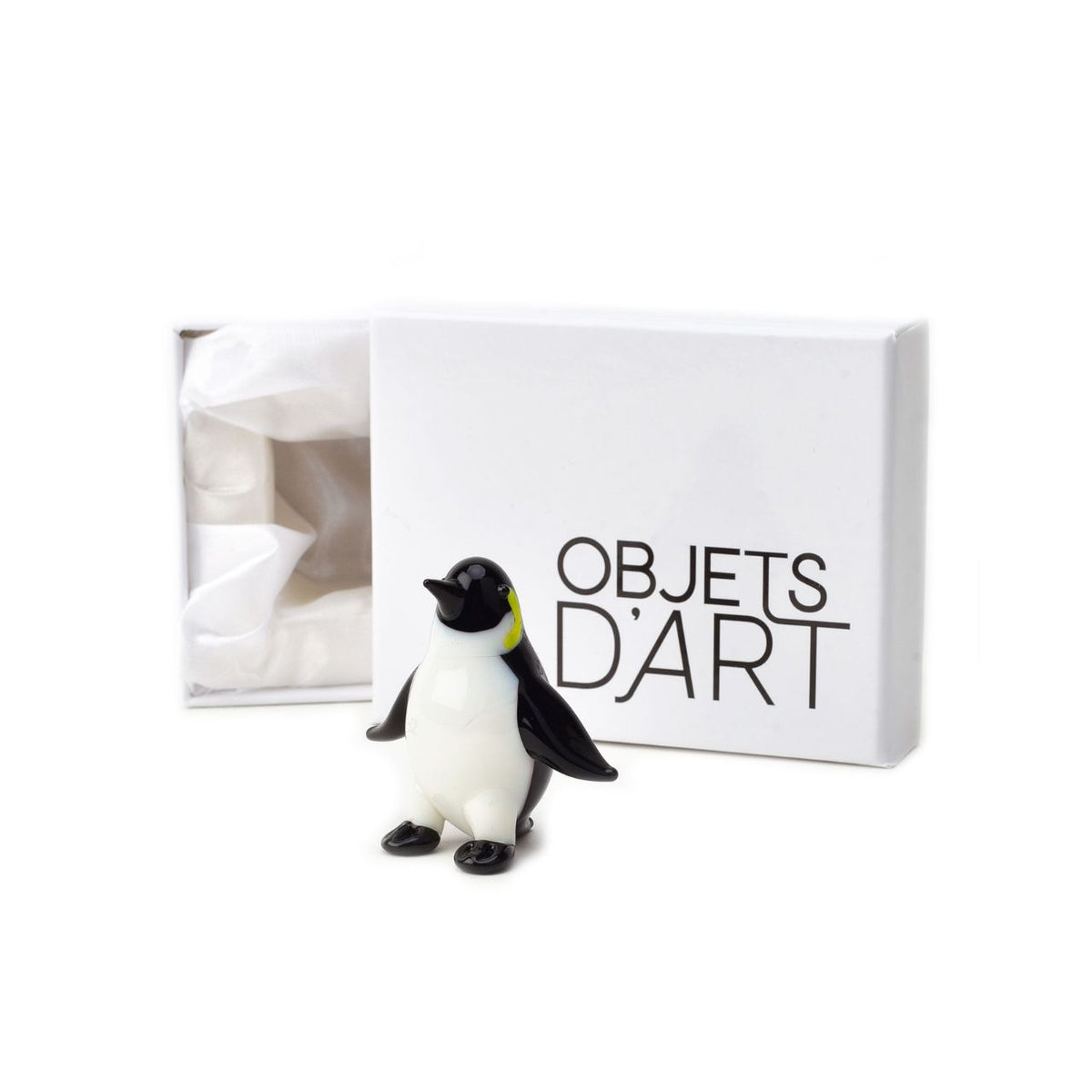 A beautifully elegant handmade glass ornament. From Objets d'Art by SOPHIA - hand blown