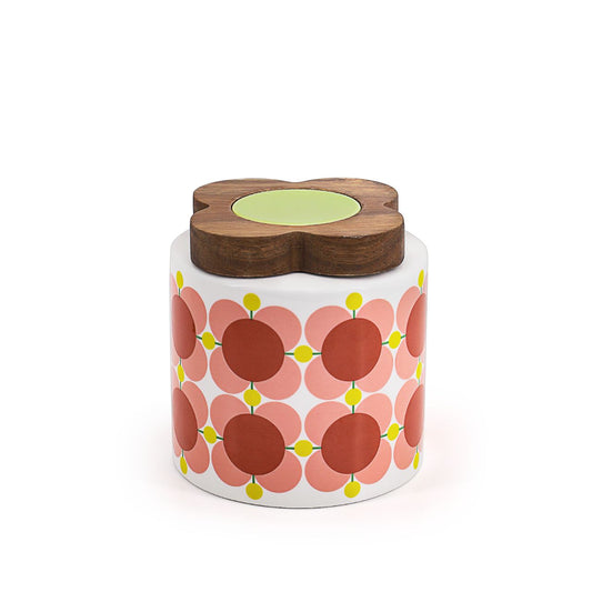 Orla Kiely Atomic Flower Bubblegum 1.1L Storage Jar  DESIGNED IN THE UK BY ORLA KIELY: This storage jar is used to store tea, sugar, pasta, rice or biscuits.  This jar has a beautiful 'Atomic Flower' print design and is made from new bone china with a unique flower shaped wooden lid. Each jar is stamped with an authentic Orla Kiely logo. 1100ml capacity.