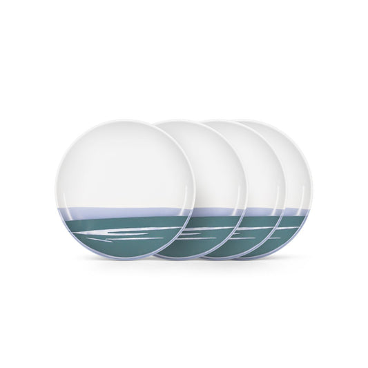 The Paul Maloney Pottery Teal Side Plates is a handmade, one-of-a-kind piece that features a unique teal glazed surface. This artisanal piece was handcrafted by Paul Maloney and features a classic design that adds stylish, contemporary charm to any kitchen.