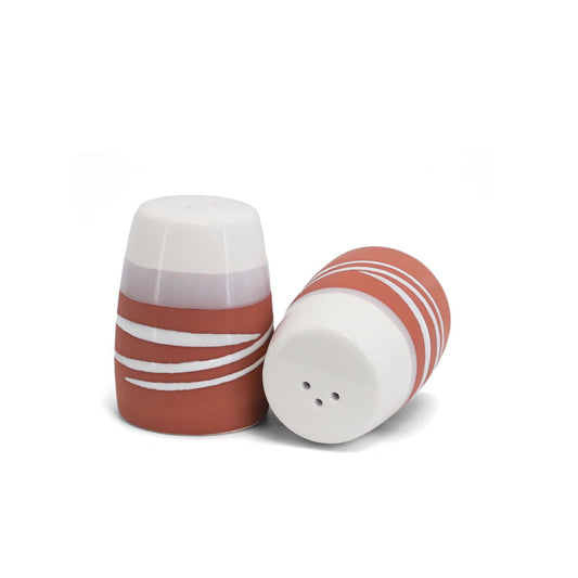 Paul Maloney Pottery Terracotta Salt & Pepper is a high quality pottery set, crafted in the traditional style. The Terracotta tone is eye-catching, and the salt and pepper shakers are perfectly designed for use. Enjoy the timeless beauty of Paul Maloney Pottery in your kitchen.