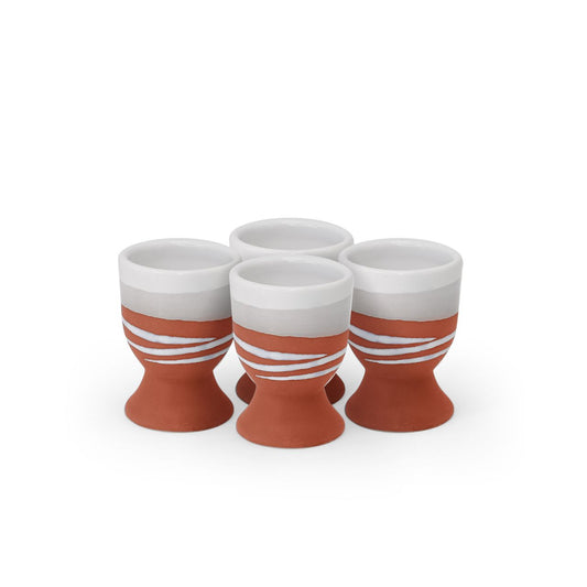 A modern twist on a classic style, this Paul Maloney Pottery Terracotta Set of 4 Egg Cups adds sophistication to your table settings. Crafted from durable and long-lasting stoneware, these egg cups are made to withstand the test of time and will be a staple of your kitchenware for years to come. Perfect for your morning eggs, they're sure to be a welcome addition to any kitchen.
