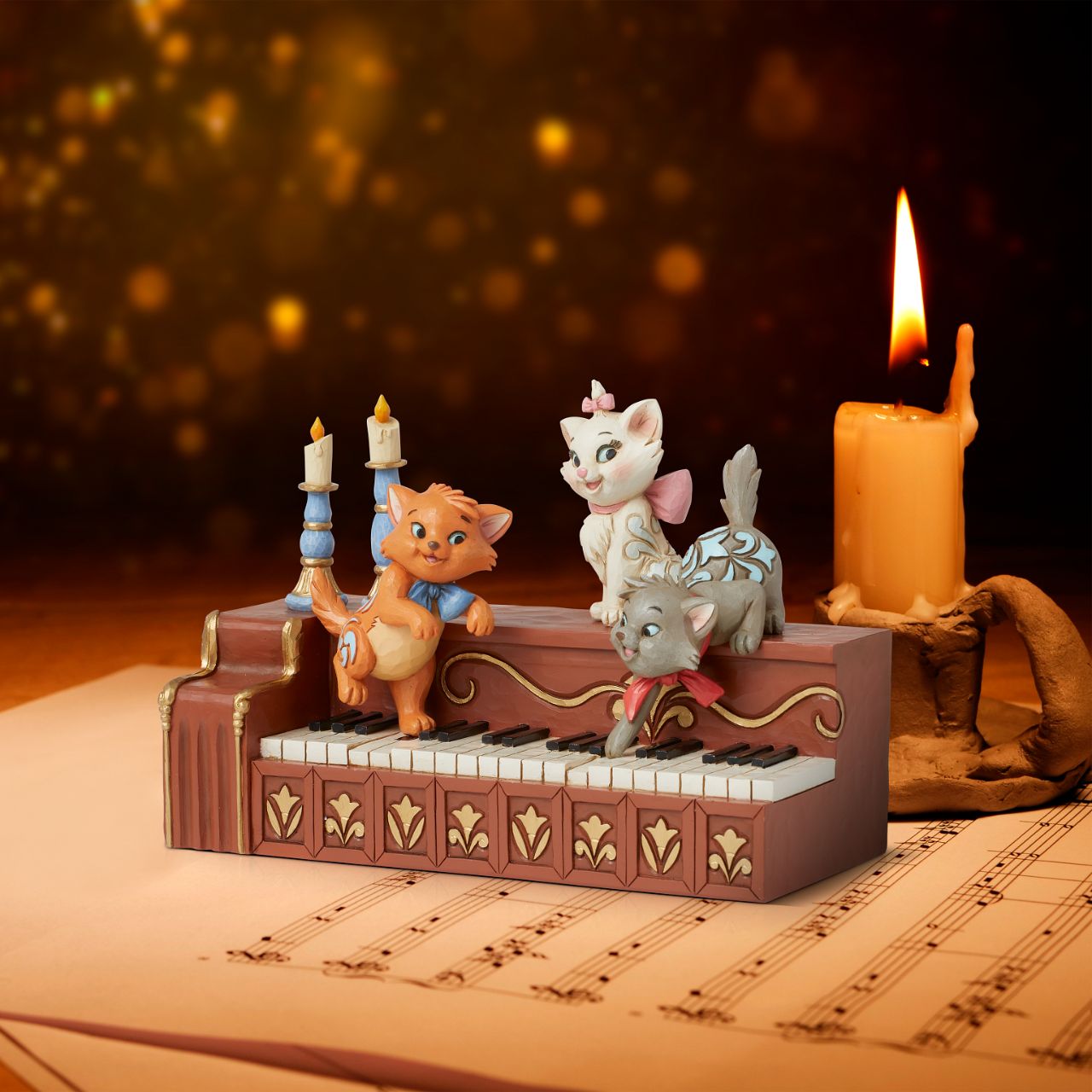 The mischievous but oh so cute kittens from Disneys Aristocats are ready play a tune. Berlioz, Marie and Toulouse are perched atop this piano, reminiscent of the iconic scene from the 1970 film, reimagined by Jim Shore as part of his Disney Traditions collections.