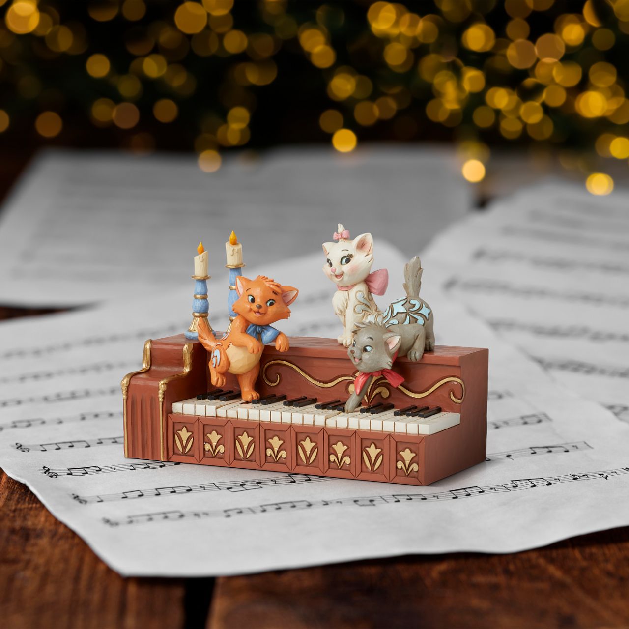 The mischievous but oh so cute kittens from Disneys Aristocats are ready play a tune. Berlioz, Marie and Toulouse are perched atop this piano, reminiscent of the iconic scene from the 1970 film, reimagined by Jim Shore as part of his Disney Traditions collections.