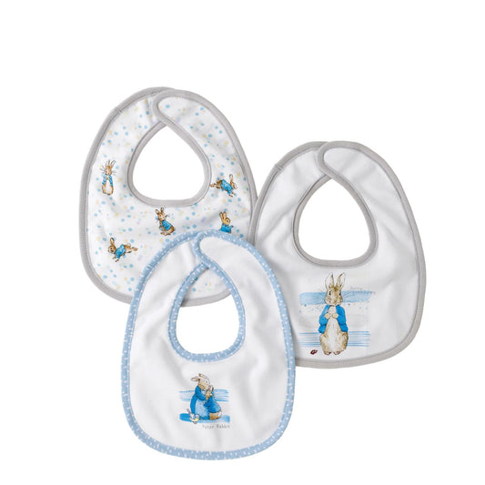 Beatrix Potter Peter Rabbit Baby Collection Bib Set of 3  Mealtimes and babies make a messy combination. So, we've created this adorable set of Peter Rabbit bibs to combat mess and keep crumbs at bay. With their super soft fabric and easy-peasy fastenings, we've got mealtimes, and baby, covered.