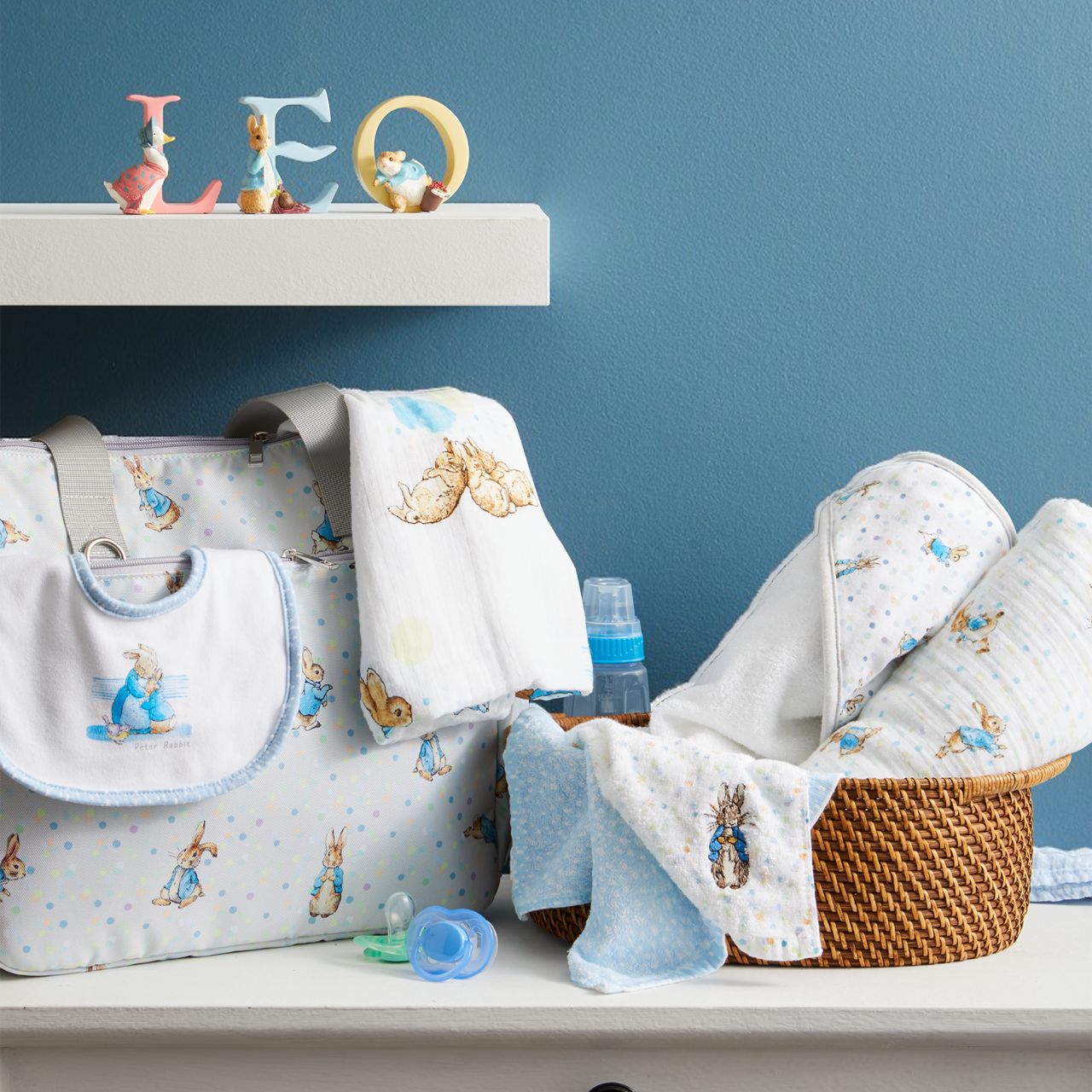 Sure to be the most-wanted piece of the whole collection is the Peter Rabbit Changing Bag. Featuring Peter Rabbit on an easily wipe-down PU fabric, off-set against pastel splashes of colour on a cool grey background