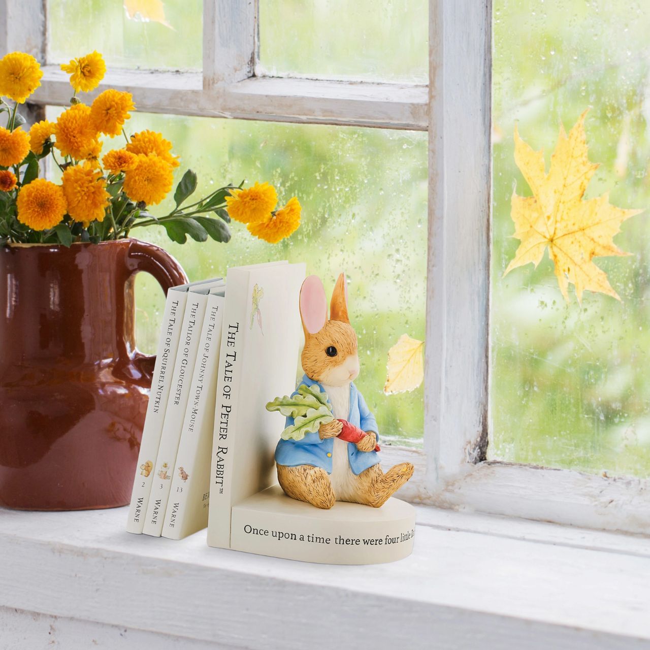 Beatrix Potter Peter Rabbit Book Stop  An ornamental Peter Rabbit bookend, designed with the famous Tale of Peter Rabbit book in mind. An ideal accessory for the living room, home office or home library space. This book stop makes the ideal collector's piece or gift. Presented in a branded box. 