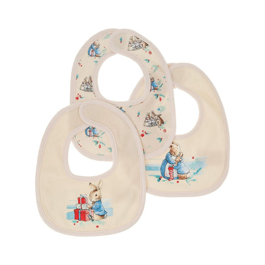 The Peter Rabbit Christmas Bibs set combines gorgeous festive designs with a practical and durable protective product. Featuring three designs, each based on the original Beatrix Potter illustrations, super soft fabric and easy-peasy fastenings, we've got mealtimes, and baby, covered.